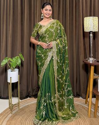 Green tissue satin embroidered saree with unstitched blouse piece. 3