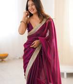 Wine tissue satin solid saree with unstitched blouse piece.