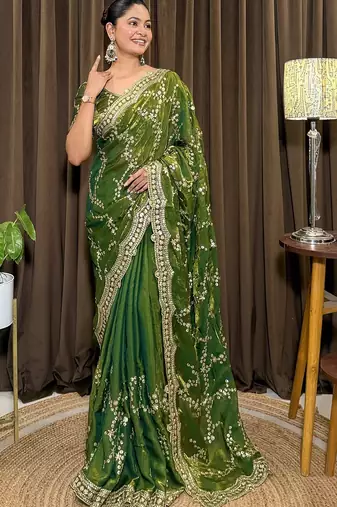 Green tissue satin embroidered saree with unstitched blouse piece.