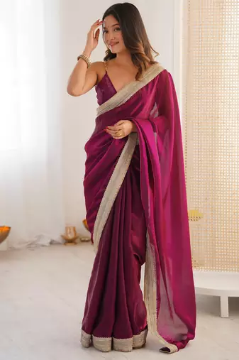 Wine tissue satin solid saree with unstitched blouse piece.