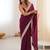 Wine tissue satin solid saree with unstitched blouse piece.