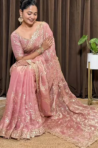 Pink tissue satin embroidered saree with unstitched blouse piece.