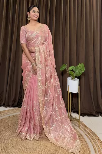 Pink tissue satin embroidered saree with unstitched blouse piece.