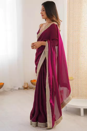 Wine tissue satin solid saree with unstitched blouse piece.