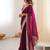 Wine tissue satin solid saree with unstitched blouse piece.