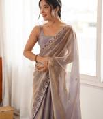 Grey tissue satin embroidered saree with unstitched blouse piece.