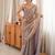 Grey tissue satin embroidered saree with unstitched blouse piece.