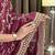 Wine tissue satin embroidered saree with unstitched blouse piece.