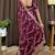 Wine tissue satin embroidered saree with unstitched blouse piece.