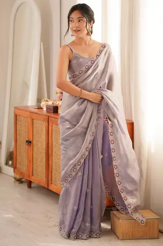 Lialc tissue satin embroidered saree with unstitched blouse piece.
