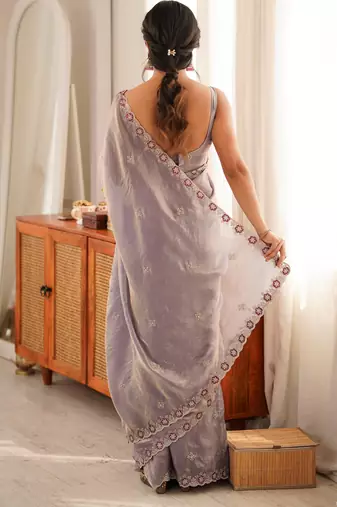 Lialc tissue satin embroidered saree with unstitched blouse piece.