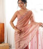 Peach tissue satin embroidered saree with unstitched blouse piece.