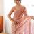 Peach tissue satin embroidered saree with unstitched blouse piece.
