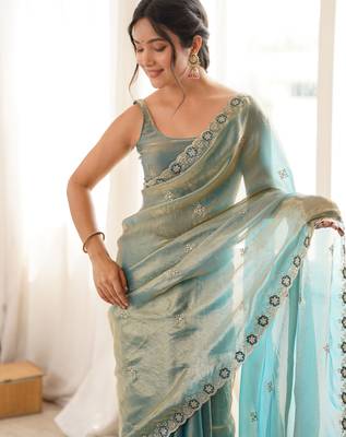 Sky blue tissue satin embroidered saree with unstitched blouse piece. 1