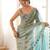 Sky blue tissue satin embroidered saree with unstitched blouse piece.