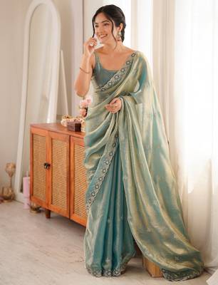 Sky blue tissue satin embroidered saree with unstitched blouse piece. 2