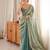 Sky blue tissue satin embroidered saree with unstitched blouse piece.