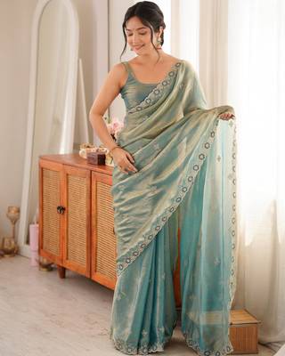 Sky blue tissue satin embroidered saree with unstitched blouse piece. 3