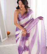 Lilac tissue satin striped saree with unstitched blouse piece.