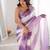 Lilac tissue satin striped saree with unstitched blouse piece.