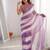 Lilac tissue satin striped saree with unstitched blouse piece.