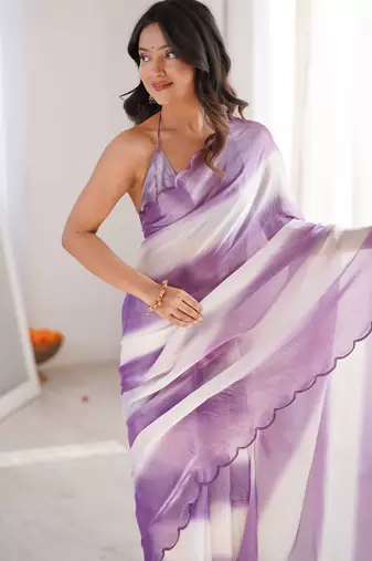 Lilac tissue satin striped saree with unstitched blouse piece.