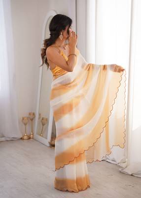 Mustard tissue satin striped saree with unstitched blouse piece. 3