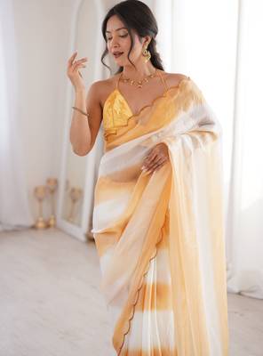 Mustard tissue satin striped saree with unstitched blouse piece. 5