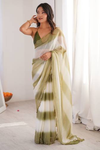Olive tissue satin striped saree with unstitched blouse piece.