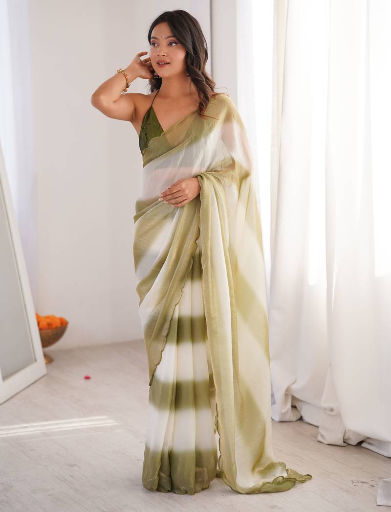 Olive tissue satin striped saree with unstitched blouse piece.