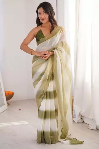 Olive tissue satin striped saree with unstitched blouse piece.