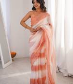 Peach tissue satin striped saree with unstitched blouse piece.