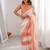 Peach tissue satin striped saree with unstitched blouse piece.