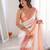 Peach tissue satin striped saree with unstitched blouse piece.