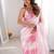 Pink tissue satin striped saree with unstitched blouse piece.