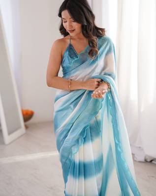 Sky blue tissue satin striped saree with unstitched blouse piece. 2