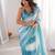 Sky blue tissue satin striped saree with unstitched blouse piece.