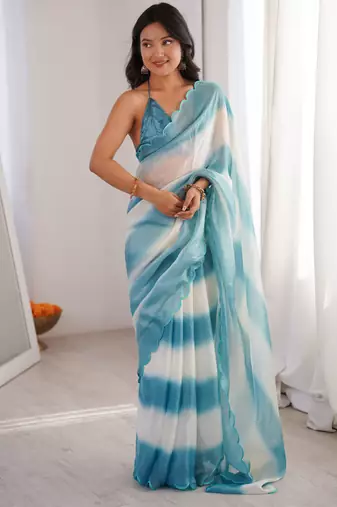 Sky blue tissue satin striped saree with unstitched blouse piece.