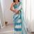Sky blue tissue satin striped saree with unstitched blouse piece.
