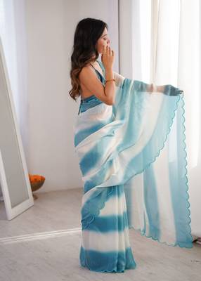Sky blue tissue satin striped saree with unstitched blouse piece. 4