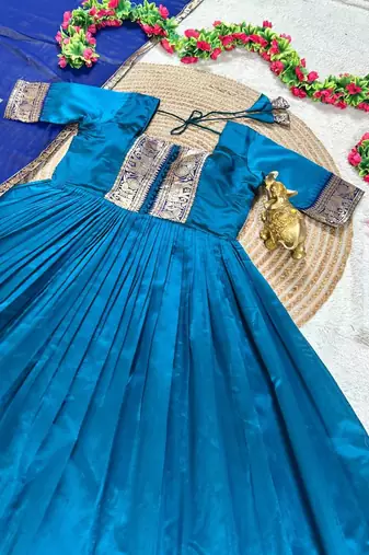 turquoise blue color rich zari border silk blend anarkali gown set