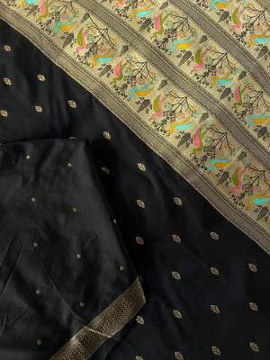 black color ilver zari chaap weaving buttis and a matching border completing silk blend saree 3