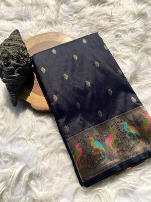 black color ilver zari chaap weaving buttis and a matching border completing silk blend saree 5