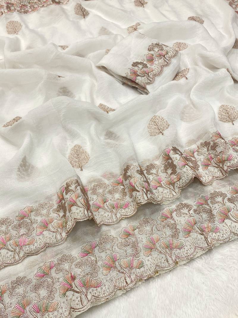 White zari embroidery work crunchy saree with blouse