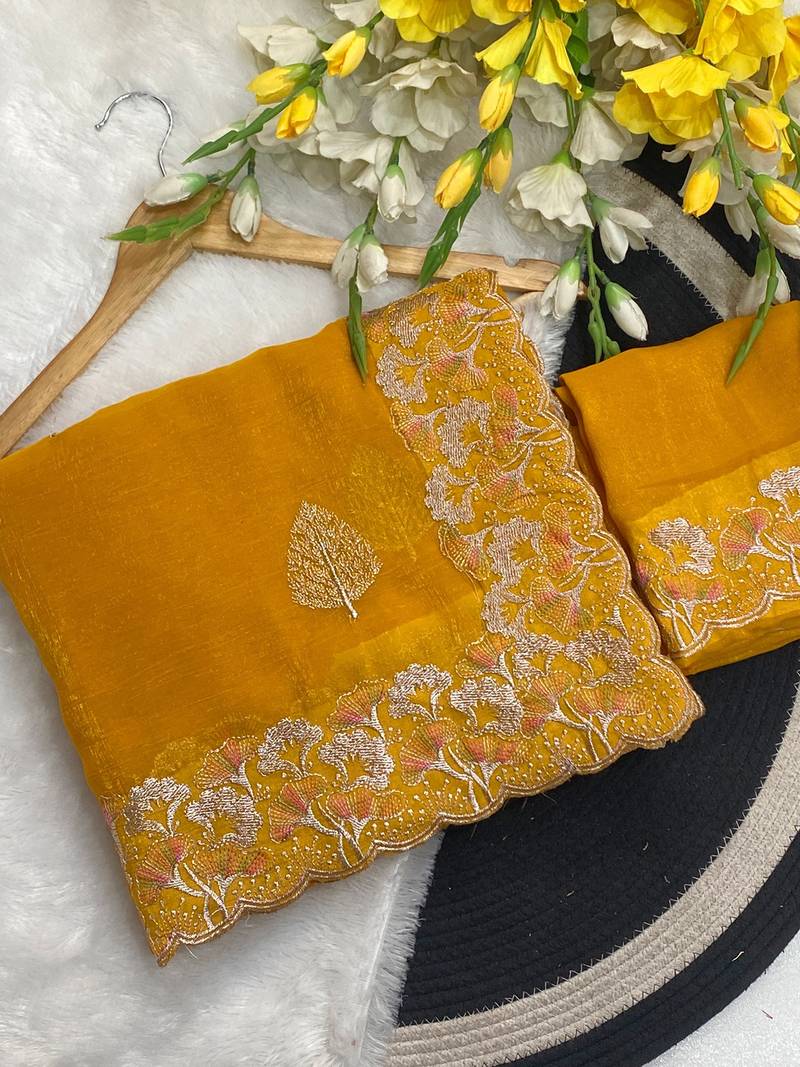 Yellow zari embroidery work crunchy saree with blouse