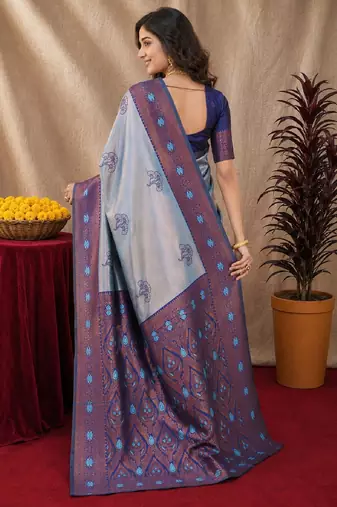 Blue rama art silk blend banarasi jacquard motif work saree with unstitched blouse piece