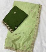 Pista zari embroidery work crunchy saree with blouse