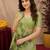 Parrot green linen jacuard bird motif work bird saree with unstitched blouse piece