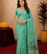 Sea green linen jacuard bird motif work bird saree with unstitched blouse piece