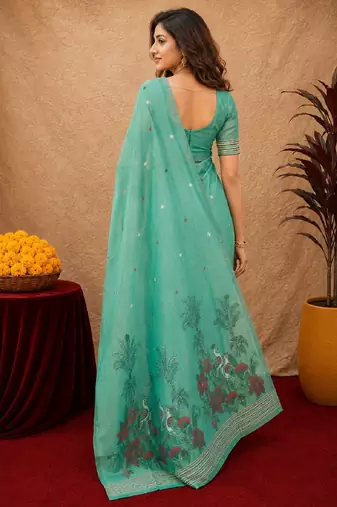 Sea green linen jacuard bird motif work bird saree with unstitched blouse piece